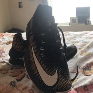 Nike black and gold AirMax tennis shoes